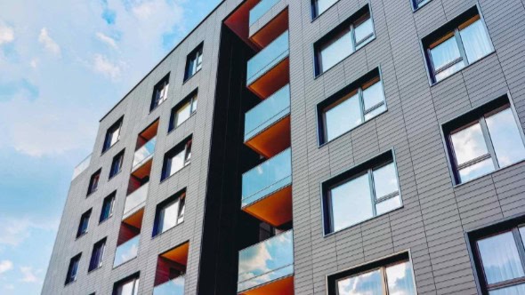 Modern-new-apartment-building-architecture@2x Flerbostadshus med ventilerad fasad.